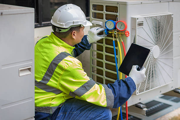 Professional Air Duct Cleaning technician working in Lake Hamilton, FL